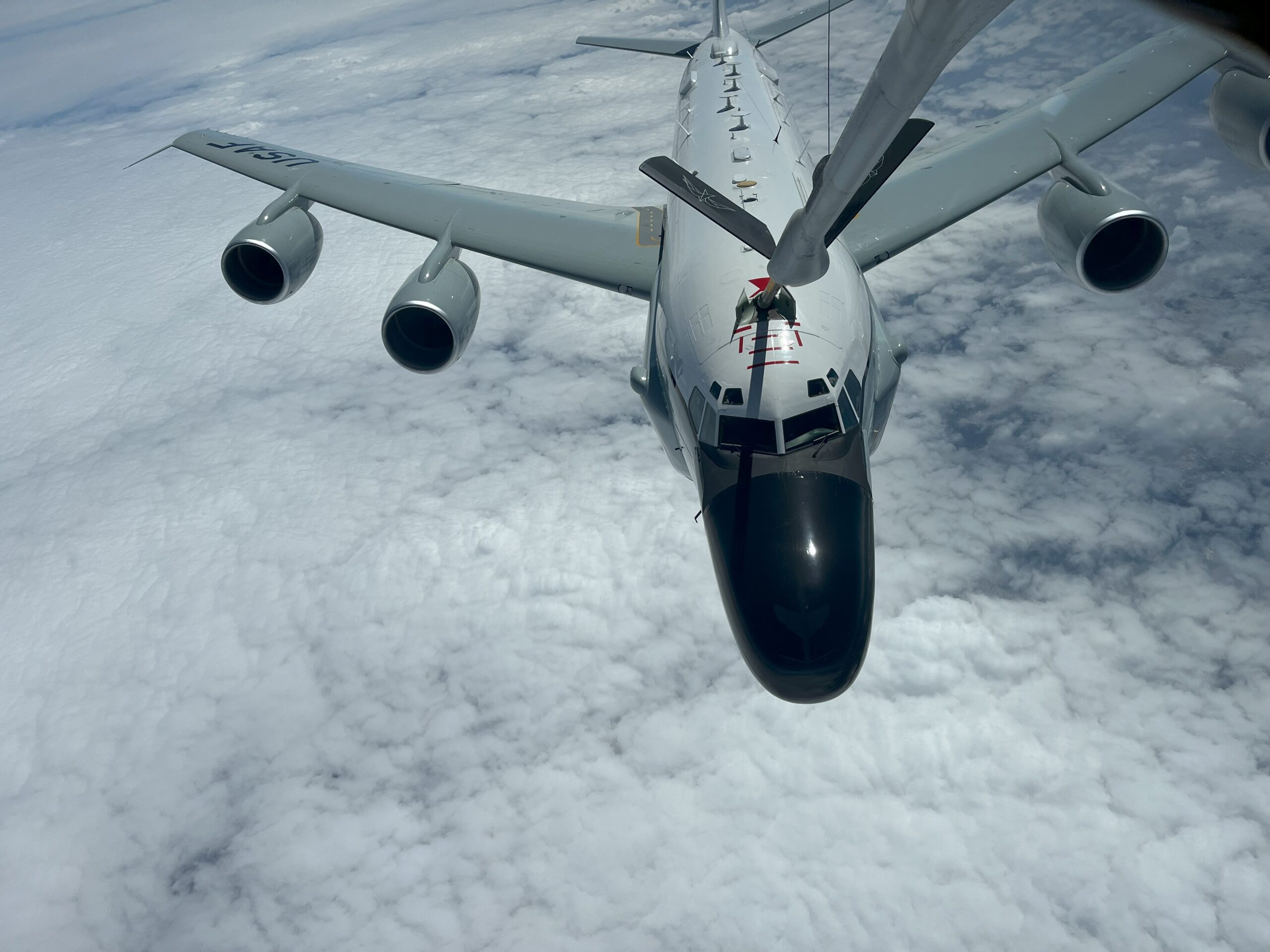 Metrea Strategic Mobility KC-135 refuels a USAF RC-135