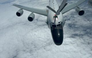 Metrea Strategic Mobility KC-135 refuels a USAF RC-135